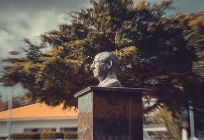 Low angle view of statue against sky