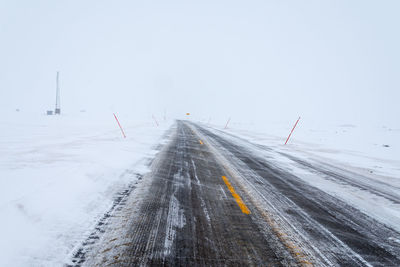 Road against sky during winter