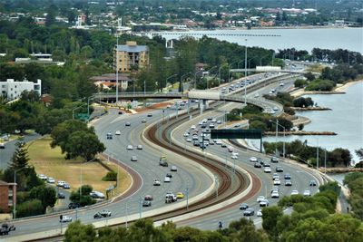 High angle view of vehicles on road in city