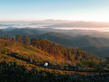 Scenic view of landscape against sky during sunset