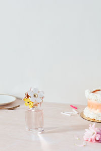 Perfume bottle and birthday cake