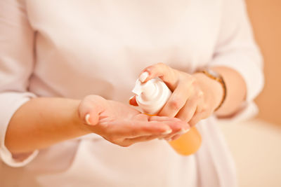 Close-up of woman holding hands