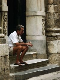 Man smoking outdoors