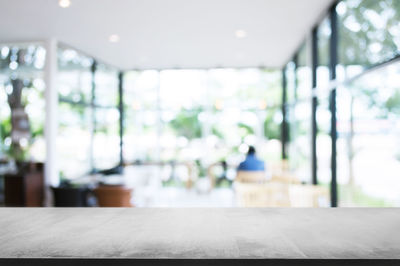 Close-up of empty seats on table in building