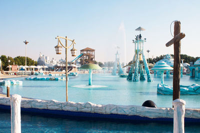 View of harbor against blue sky