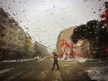 Wet glass window in rainy season