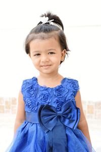 Close-up portrait of smiling girl