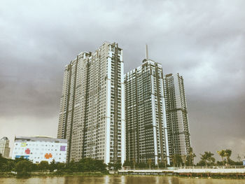 Low angle view of modern buildings against sky