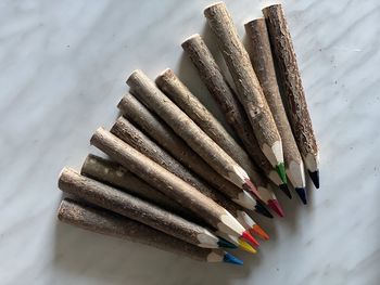 High angle view of colored pencils on table