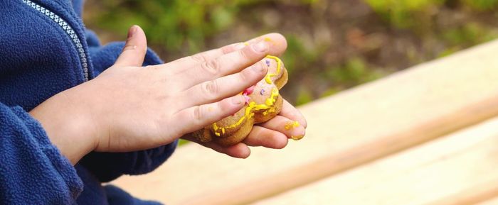 Close-up of hands holding ice cream