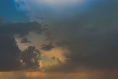 Low angle view of dramatic sky during sunset