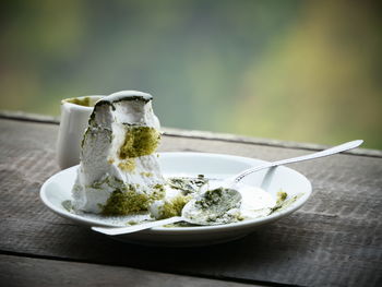 Close-up of ice cream in bowl on table