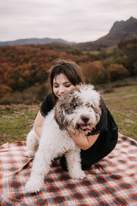 Portrait of man with dog