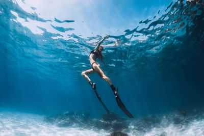 Man swimming in sea