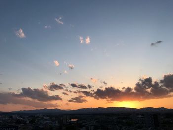 Scenic view of silhouette land against sky during sunset