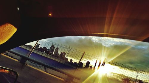 Panoramic view of buildings against sky during sunset