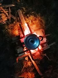 High angle view of illuminated fire hydrant at night