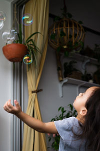 Girl standing at home