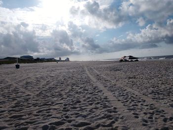 Scenic view of beach against sky