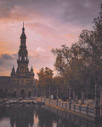 Buildings against sky during sunset