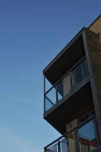 Low angle view of built structure against blue sky