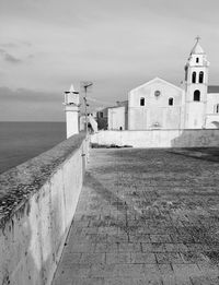 Church on deaolate piazza by the sea