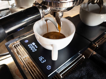 High angle view of coffee cup on table