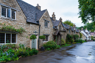 Castle combe, quaint village with well preserved masonry houses in cotswolds. england, uk