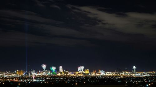 Illuminated cityscape at night