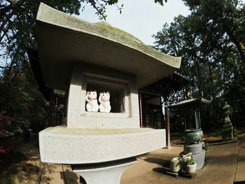 Building with trees in background