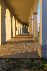 Sunset between the columns. ancient residence of the doge of venice. udine. italy