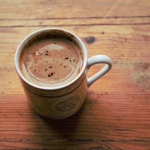 Close-up of coffee cup on table