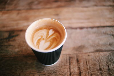 Close-up of cappuccino on table