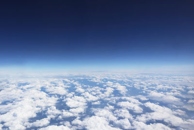 Aerial view of clouds over blue sky