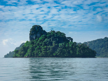 Scenic view of sea against cloudy sky