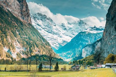 Scenic view of snowcapped mountains against sky