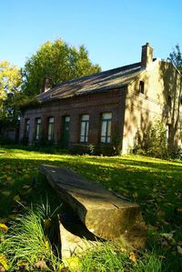 Built structure with trees in foreground