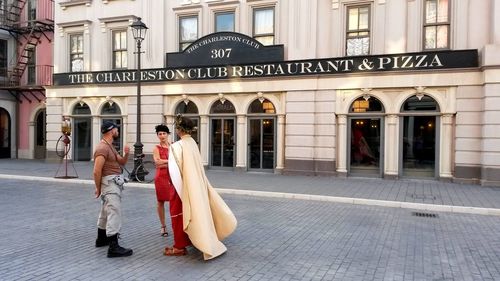 People in front of building