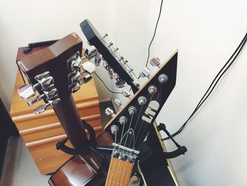 Close-up of man playing guitar