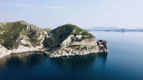 Mountain rising from the lake