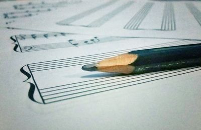 High angle view of pen on paper