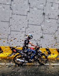 Cars on wet road during rainy season