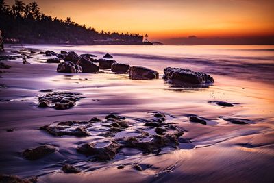 Scenic view of sea at sunset