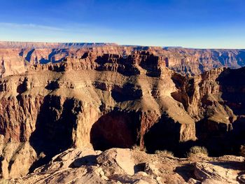 Panoramic view of rock formations against sky