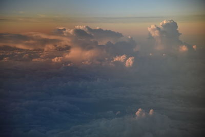 Low angle view of clouds in sky during sunset