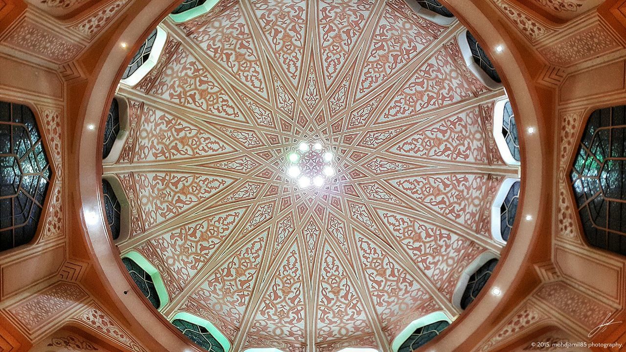 indoors, ceiling, design, pattern, religion, ornate, place of worship, spirituality, architectural feature, architecture, church, famous place, built structure, arch, interior, art, art and craft, travel destinations, low angle view