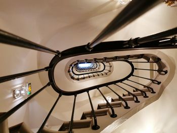 Low angle view of spiral staircase in building