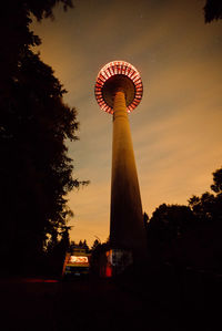 Low angle view of tower against sky during sunset