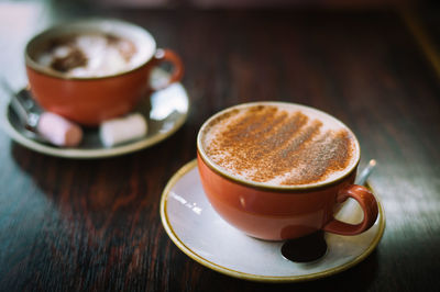 Close-up of cappuccino on table