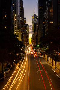 Light trails on city street at night